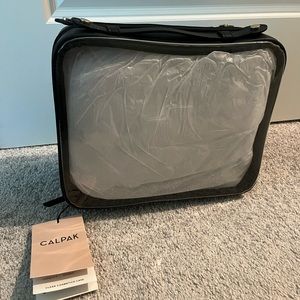 NWT CALPAK Clear Cosmetic Case - Black